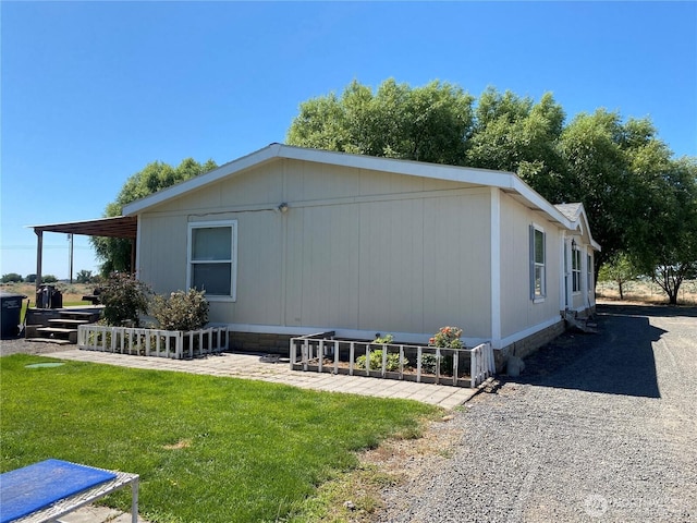 4820 NE 7.5 Rd, Moses Lake, WA 98837 - view of property exterior with a yard