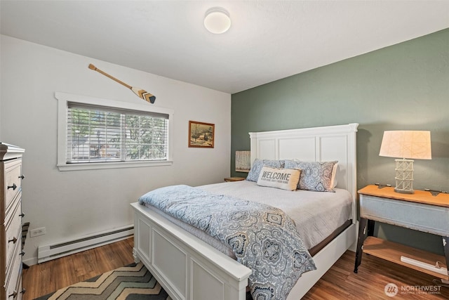 1313 Front St, Leavenworth, WA 98826 - bedroom featuring baseboard heating and wood finished floors