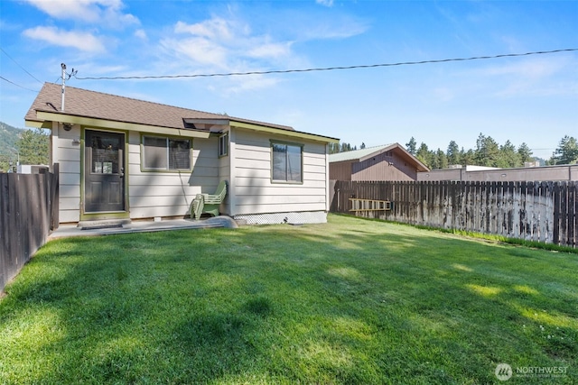 1313 Front St, Leavenworth, WA 98826 - back of house with a fenced backyard