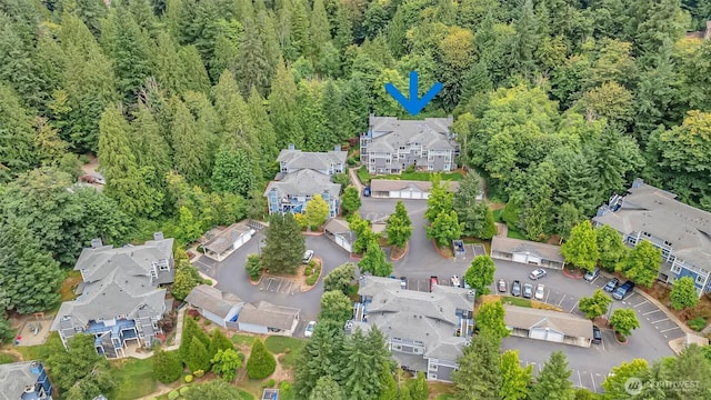 3924 243rd Pl SE Unit G204, Bothell, WA 98201 - aerial overview of property's location with nearby suburban area and a forest