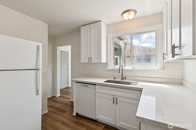 3154 Pear St SE, Olympia, WA 98501 - kitchen featuring white appliances, white cabinets, dark wood finished floors, and light stone countertops