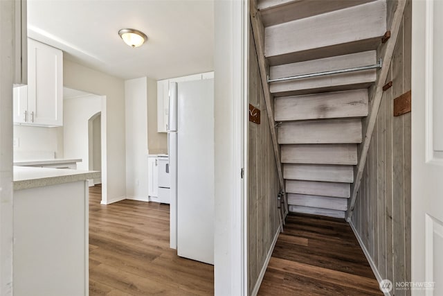 3154 Pear St SE, Olympia, WA 98501 - stairs with arched walkways and wood finished floors
