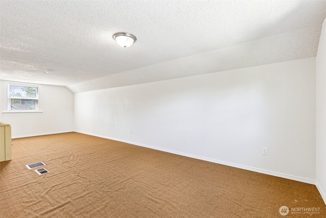 3154 Pear St SE, Olympia, WA 98501 - additional living space with lofted ceiling, carpet, and a textured ceiling