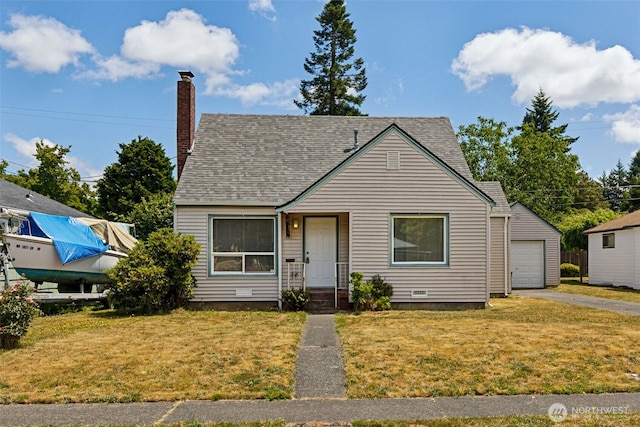3154 Pear St SE, Olympia, WA 98501 - view of front of house with a front yard, a chimney, asphalt driveway, and roof with shingles