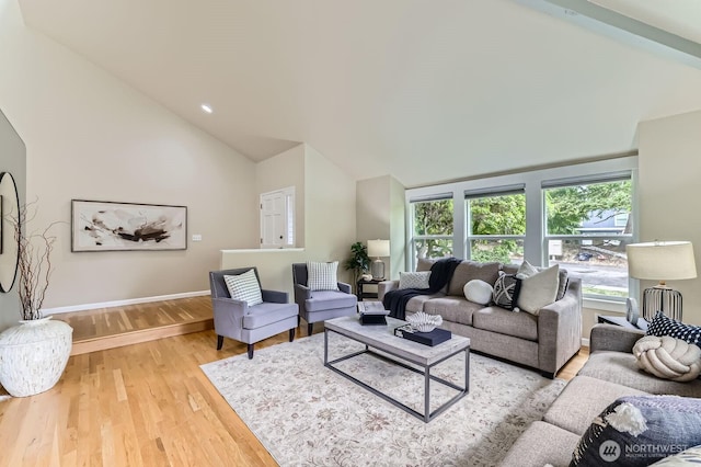 14111 NE 63rd Ct, Redmond, WA 98052 - living room with vaulted ceiling and light wood-style flooring