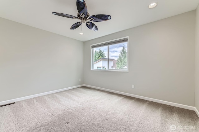 14111 NE 63rd Ct, Redmond, WA 98052 - empty room featuring light colored carpet, ceiling fan, and recessed lighting