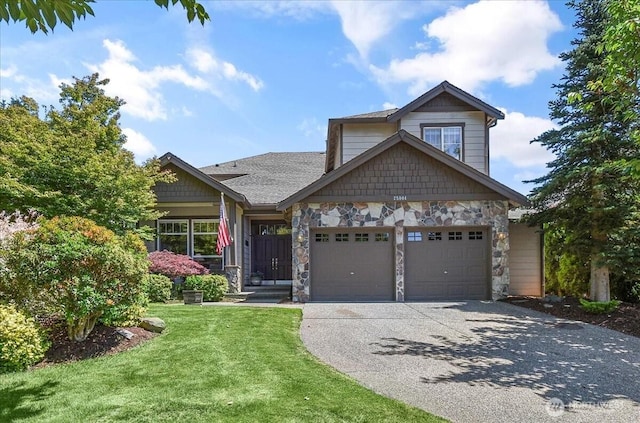 25004 163rd Pl SE, Covington, WA 98042 - craftsman-style home featuring stone siding, a garage, driveway, and a front yard