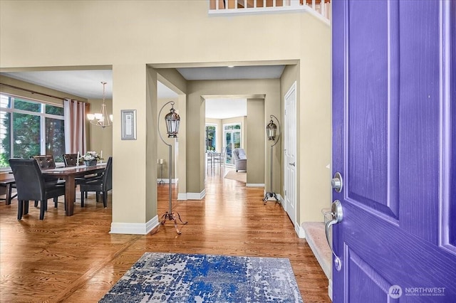 25004 163rd Pl SE, Covington, WA 98042 - entryway featuring a chandelier and wood finished floors