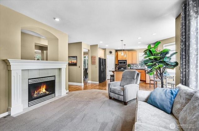 25004 163rd Pl SE, Covington, WA 98042 - living area featuring a tiled fireplace and recessed lighting