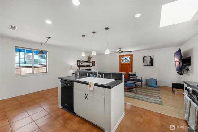 8851 48th Pl W, Mukilteo, WA 98275 - kitchen with dishwasher, white cabinetry, light tile patterned flooring, recessed lighting, and a ceiling fan