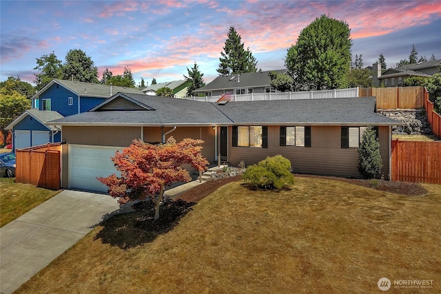 8851 48th Pl W, Mukilteo, WA 98275 - view of front of house with an attached garage, concrete driveway, and roof with shingles