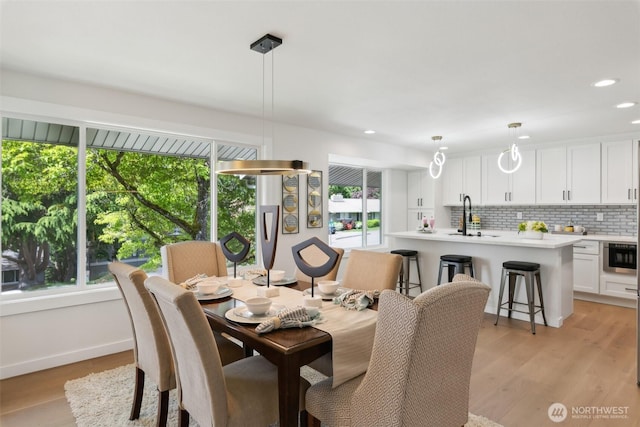 2204 139th Pl SE, Bellevue, WA 98005 - dining space with plenty of natural light, light wood-type flooring, and recessed lighting