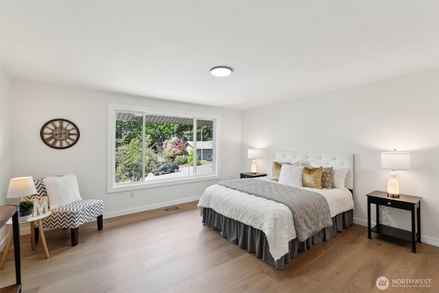 2204 139th Pl SE, Bellevue, WA 98005 - bedroom with light wood finished floors and baseboards