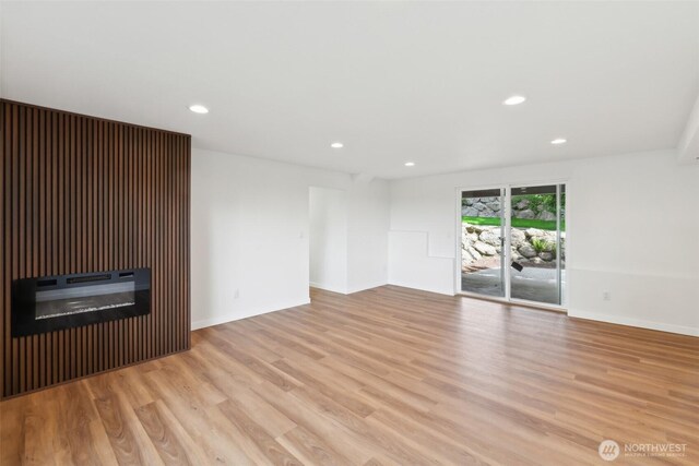 2204 139th Pl SE, Bellevue, WA 98005 - unfurnished living room featuring wood finished floors and recessed lighting