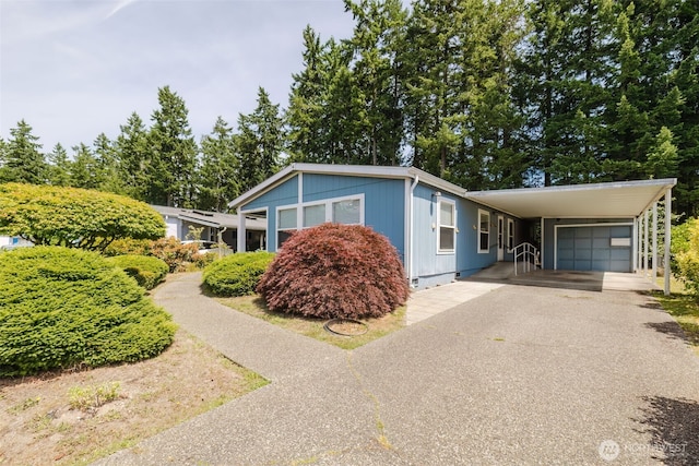 2072 Hastings Ln SE, Port Orchard, WA 98367 - view of front facade with driveway, an attached carport, and crawl space