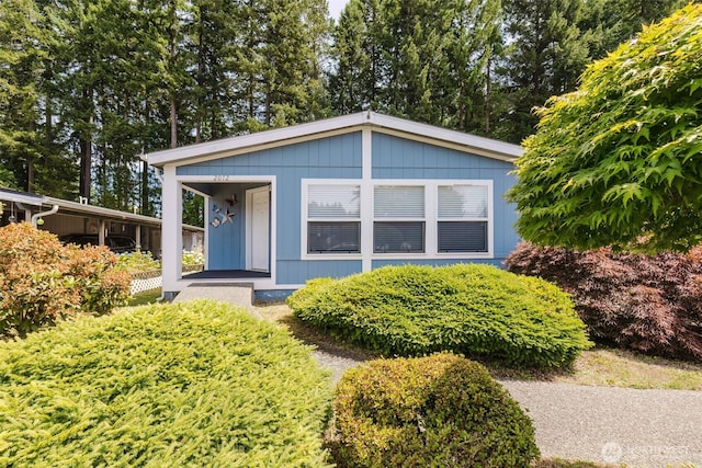 2072 Hastings Ln SE, Port Orchard, WA 98367 - view of front facade with covered porch and view of scattered trees
