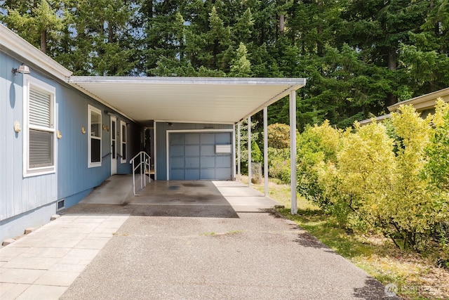 2072 Hastings Ln SE, Port Orchard, WA 98367 - view of parking featuring asphalt driveway and an attached carport