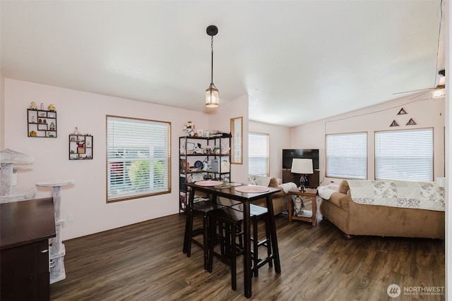 2072 Hastings Ln SE, Port Orchard, WA 98367 - dining room featuring dark wood finished floors, vaulted ceiling, and ceiling fan