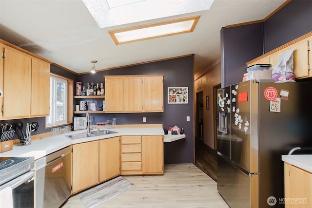 2072 Hastings Ln SE, Port Orchard, WA 98367 - kitchen with appliances with stainless steel finishes, light brown cabinetry, light wood-style flooring, ornamental molding, and vaulted ceiling