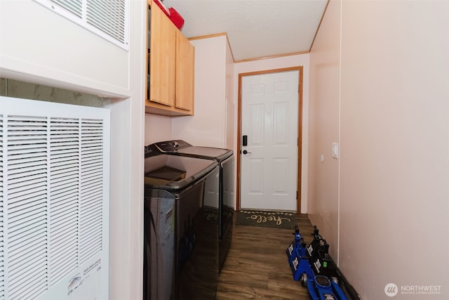 2072 Hastings Ln SE, Port Orchard, WA 98367 - laundry area with a heating unit, independent washer and dryer, dark wood-style flooring, and cabinet space