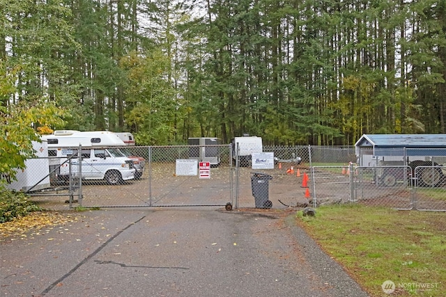 2072 Hastings Ln SE, Port Orchard, WA 98367 - view of asphalt driveway with a gate