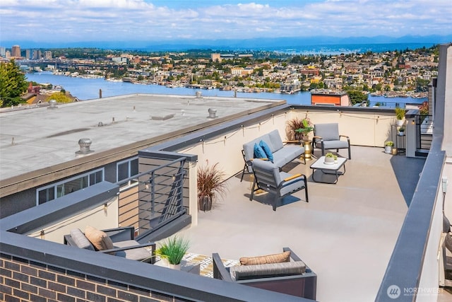 1918 5th Ave N Unit B, Seattle, WA 98109 - view of patio with an outdoor hangout area and a water view