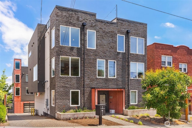 1918 5th Ave N Unit B, Seattle, WA 98109 - view of front facade featuring brick siding