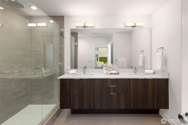 1918 5th Ave N Unit B, Seattle, WA 98109 - bathroom featuring double vanity, a shower stall, and tile patterned flooring