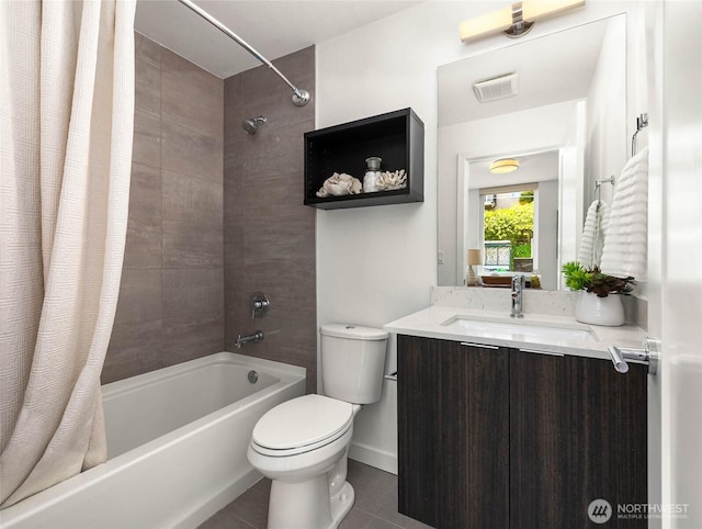1918 5th Ave N Unit B, Seattle, WA 98109 - bathroom featuring shower / bath combo with shower curtain, tile patterned floors, and vanity