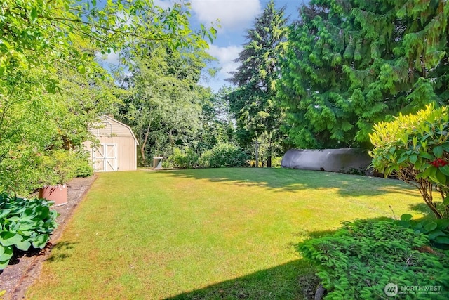 2404 SW 170th St, Burien, WA 98166 - view of grassy yard with a storage unit