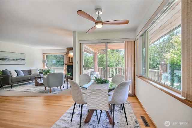 2404 SW 170th St, Burien, WA 98166 - dining room featuring a ceiling fan and light wood-style flooring