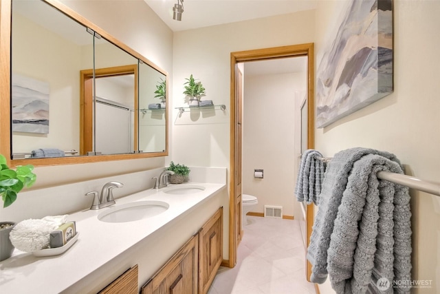 2404 SW 170th St, Burien, WA 98166 - bathroom featuring double vanity and tile patterned floors
