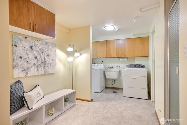 2404 SW 170th St, Burien, WA 98166 - laundry room with cabinet space, separate washer and dryer, and light floors