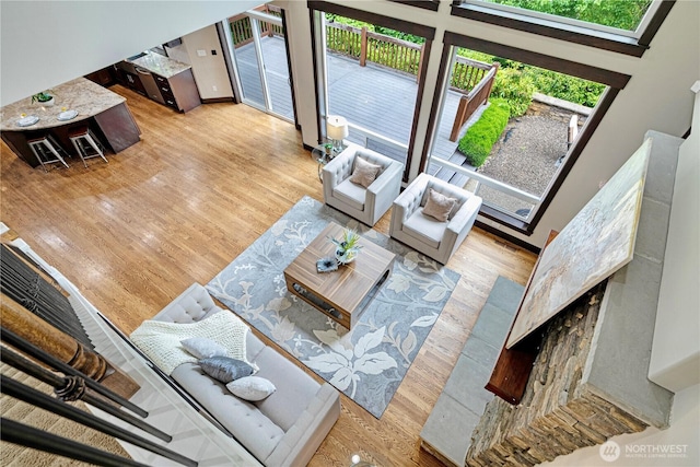 8019 149th Pl SE, Newcastle, WA 98059 - living room featuring wood finished floors and plenty of natural light