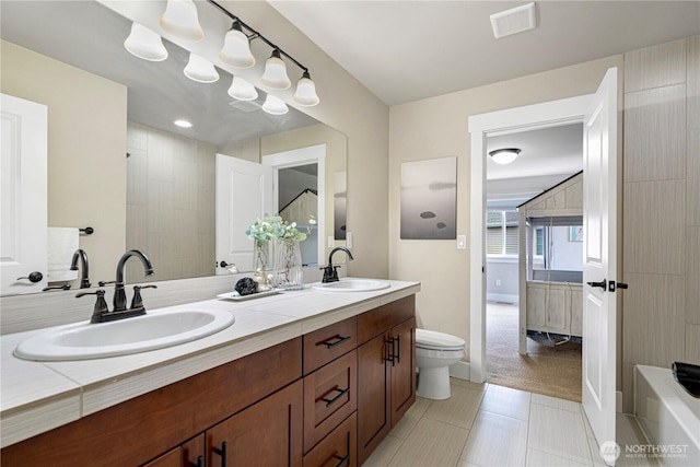 8019 149th Pl SE, Newcastle, WA 98059 - full bathroom with double vanity, a bath, and tile patterned floors
