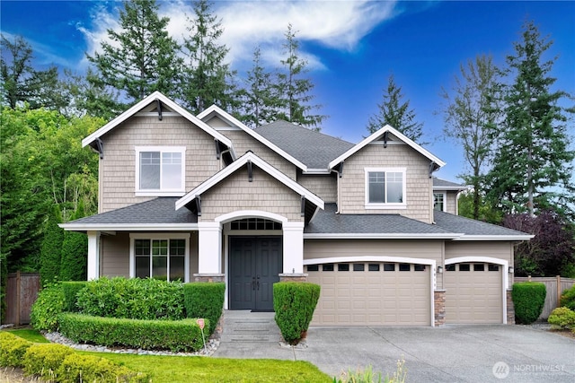 8019 149th Pl SE, Newcastle, WA 98059 - craftsman inspired home featuring a garage, roof with shingles, and driveway