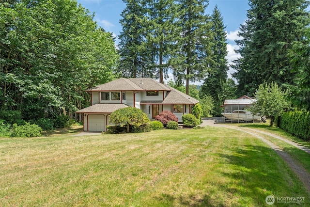 16714 Broadway Ave, Snohomish, WA 98296 - view of front of home with an attached garage, driveway, and a front yard
