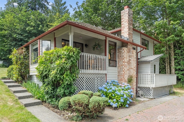16714 Broadway Ave, Snohomish, WA 98296 - view of front of home with a chimney and covered porch
