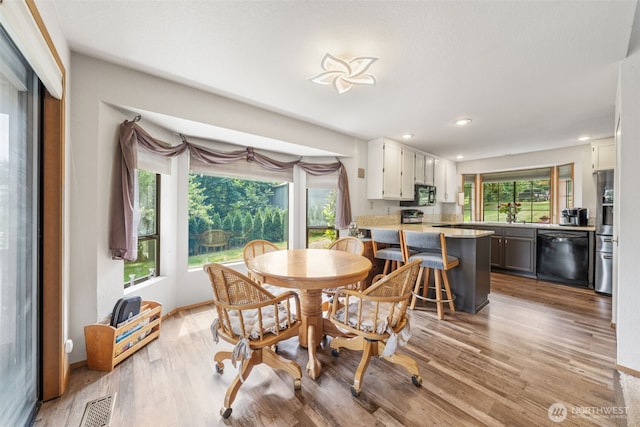 16714 Broadway Ave, Snohomish, WA 98296 - dining area featuring recessed lighting and light wood finished floors