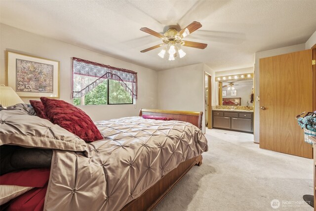 16714 Broadway Ave, Snohomish, WA 98296 - bedroom with light colored carpet, ensuite bathroom, ceiling fan, and a textured ceiling