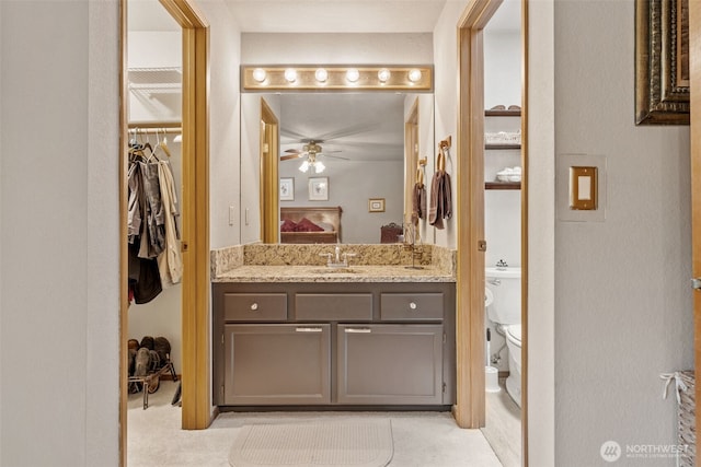 16714 Broadway Ave, Snohomish, WA 98296 - ensuite bathroom featuring vanity, a ceiling fan, and a spacious closet
