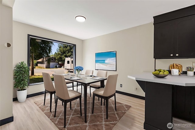 136 D St, Buckley, WA 98321 - dining space with light wood-style floors and baseboards