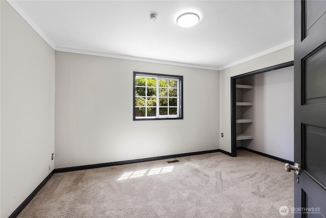 136 D St, Buckley, WA 98321 - unfurnished bedroom featuring carpet floors and ornamental molding