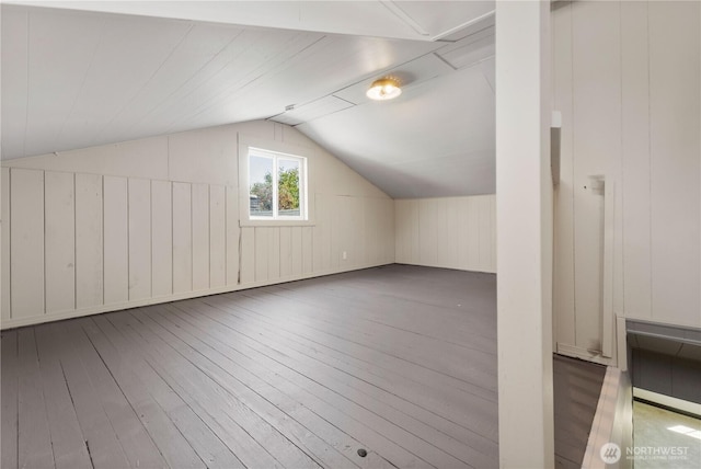 136 D St, Buckley, WA 98321 - bonus room featuring wood-type flooring and vaulted ceiling
