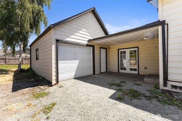 136 D St, Buckley, WA 98321 - garage with french doors and gravel driveway