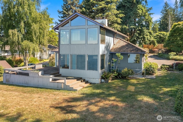 10634 SW Cowan Rd, Vashon, WA 98070 - rear view of property with a chimney