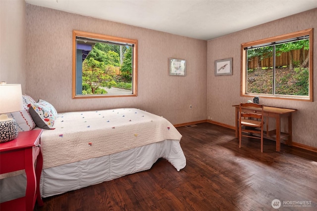 10634 SW Cowan Rd, Vashon, WA 98070 - bedroom featuring wood finished floors and baseboards