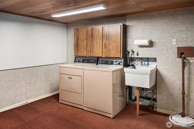 10634 SW Cowan Rd, Vashon, WA 98070 - washroom with independent washer and dryer, dark colored carpet, wallpapered walls, and wood ceiling
