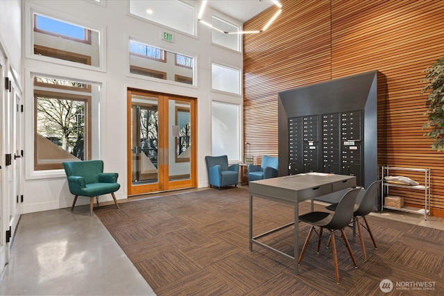 4422 Woodlawn Ave N Unit 213, Seattle, WA 98103 - home office with a towering ceiling and wood walls
