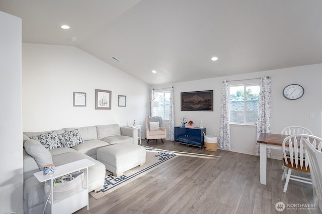 1205 W Sequoia Rd, Moses Lake, WA 98837 - living area with wood finished floors, healthy amount of natural light, lofted ceiling, and recessed lighting